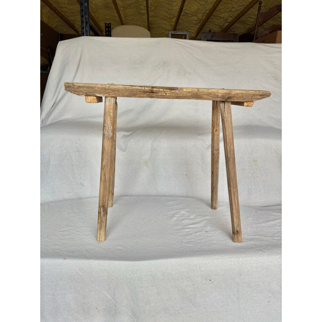Found in the South of France, this 19th Century Primitive Wood Bench was handcrafted in the late 1800's. The piece...