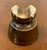 This is a gorgeous antique brown saddle back ceramic glazed insulator with a chip as pictured. Dimensions: - 4 in wide - 4...