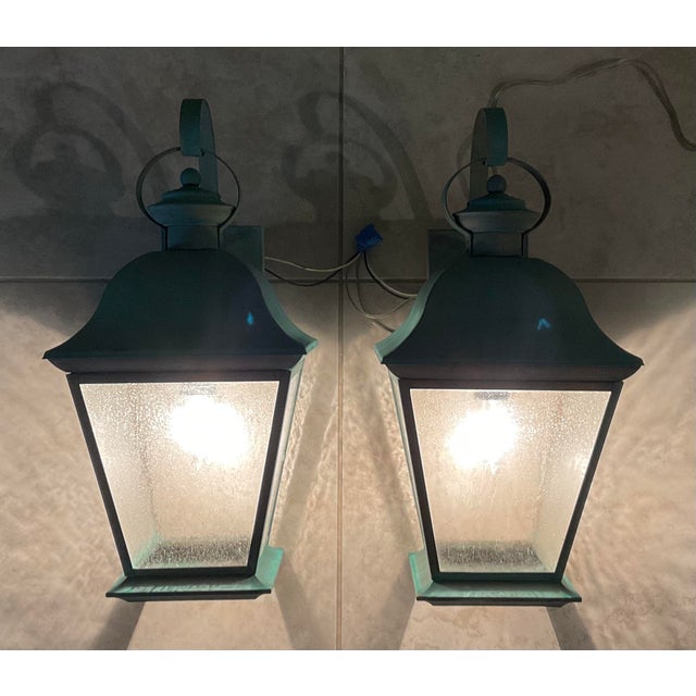 pair of vintage solid brass lanterns exudes timeless elegance and old-world charm. Crafted from , high-quality solid...