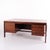 Rosewood desk designed by arne vodder and manufactured by sibast furniture in the 1960s. The desk features a large work...