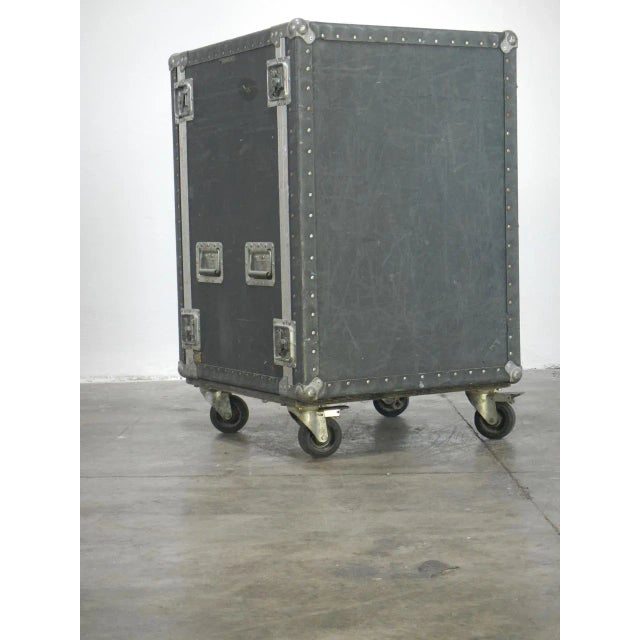This vintage Flight suitcase was built with pressed cardboard and resin and features rivets folded inside. It was produced...