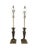 An impressive and substantial pair of vintage solid brass table lamps featuring a bold neoclassical column form with...