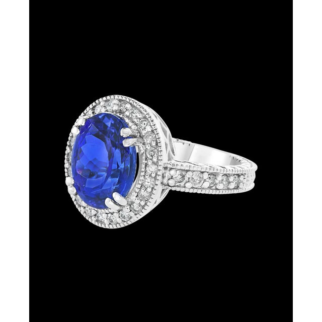 6 Carat Oval Tanzanite and 1 Carat Diamond Ring 14 Karat White Gold, Estate For Sale - Image 4 of 18