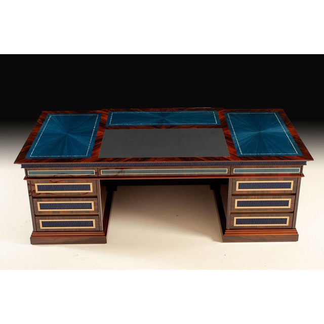 Handcrafted in Italy, this substantial executive desk is constructed from solid walnut and finished with richly figured...