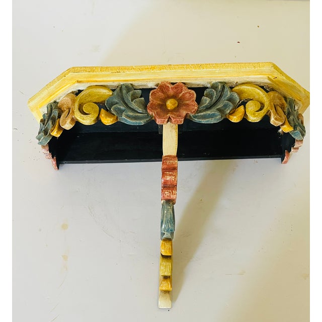 Antique handcarved wood floral polychrome console table.