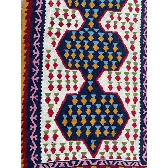 Nice vintage Kilim with beautiful geometric design and nice colors, entirely hand woven with wool on cotton foundation.