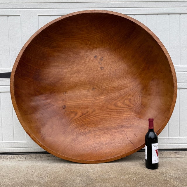 This wonderfully large antique rustic bowl was originally used to prepare dough. This rare oversize wooden bowl would be...
