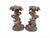 An exceptional pair of 19th-century Black Forest carved wooden candlesticks, richly decorated with traditional hunting...