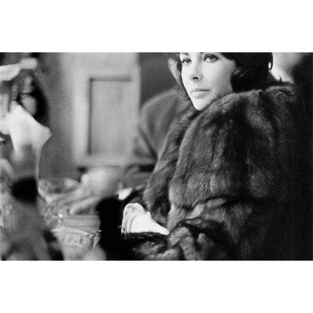 Elizabeth Taylor British-born American actress Elizabeth Taylor (1932 - 2011) at London Airport (now Heathrow) before a...