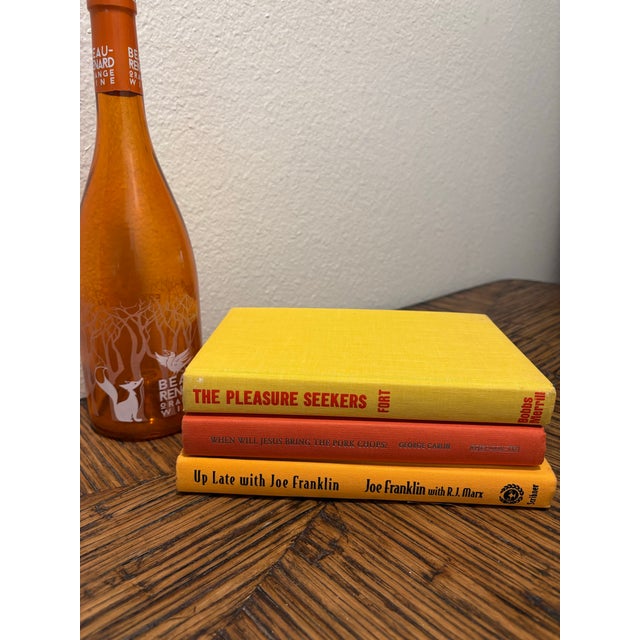 Make a confident, high-energy statement in your space with this curated trio of modern and vintage hardcovers. Styled...