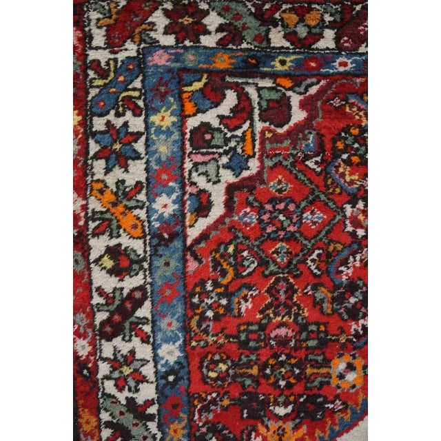 This hand -knotted rug with brushes and striking colors. Hand knotted with the greatest care and attention to detail, this...