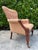 A handsome Hickory Chair Edwardian Club Chair featuring a richly finished mahogany frame, deep button tufting, and brass...