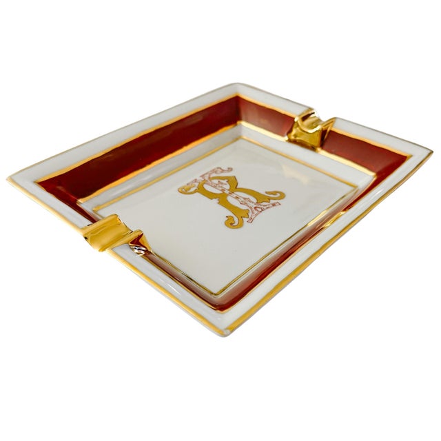 Sourced from a renowned antique market in Florence, Italy, this rectangular porcelain ceramic cigar ashtray features a...