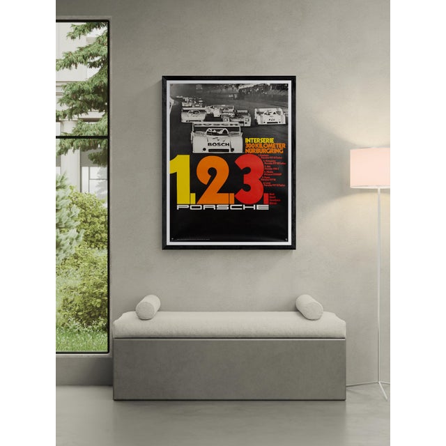 The Piece This original 1973 Porsche poster celebrates the Interserie 300km race at the Nürburgring. Designed by the...