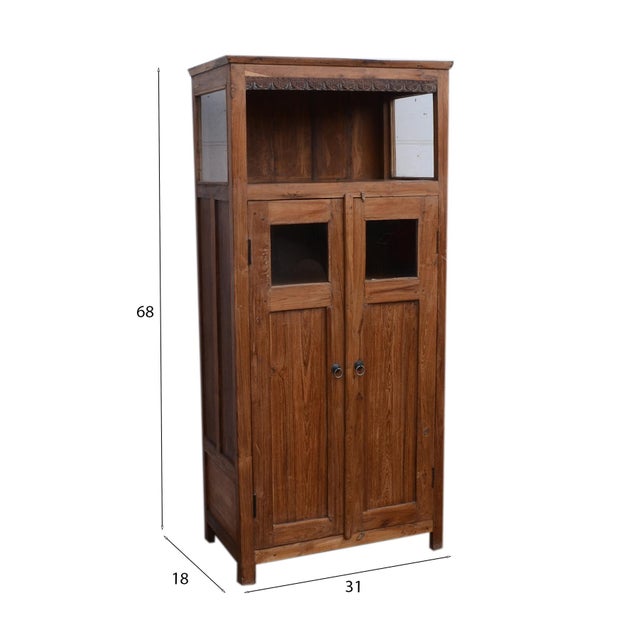 The Reclaimed Teak wood display Cabinet by Manzel Furniture features a solid rectangular design with an aged metal handle...