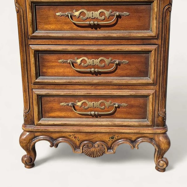 A charming secretary desk from Drexel Heritage's Brittany Collection, crafted in the United States circa the 1970s. Its...