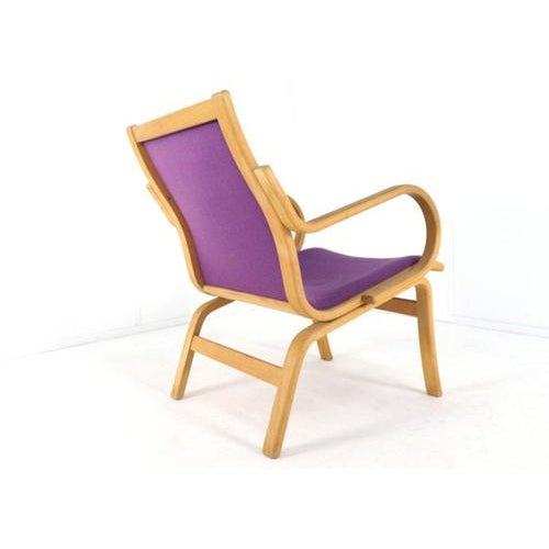 with its Danish roots and designed by Bent Olsen for manufacturer Velje, this armchair strikes a refined balance between...