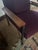 Super sophisticated midcentury modern imported Vermund Larsen “Cosy” Danish armchair having black metal base, walnut...