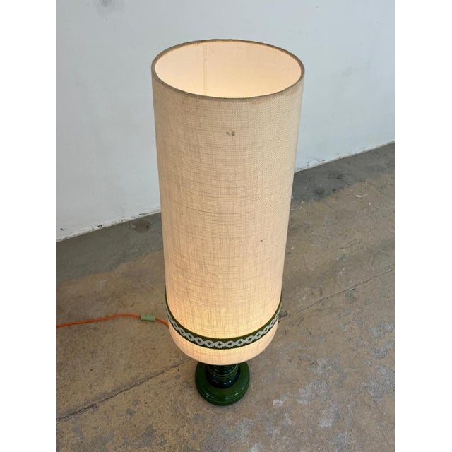 This floor lamp from aro leuchten (model no. 476 50) is a highlight for lovers of west german pottery, bringing the...