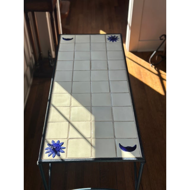 A striking mid-century Italian style console table, entry table, or slim sofa table featuring an exceptional raised-relief...