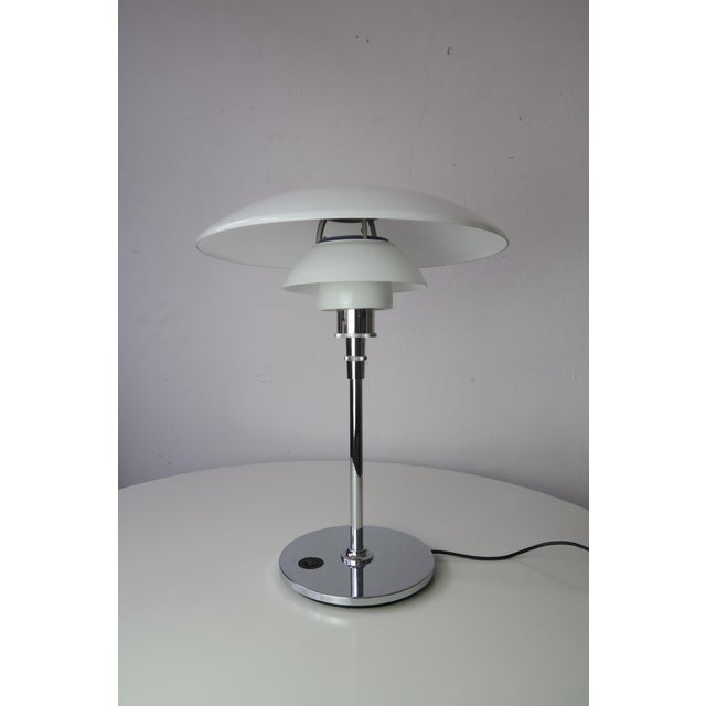 Original ph 4 1/2 - 3 1/2 table lamp in very good condition. poul henningsen designed the three-shade system as early as...