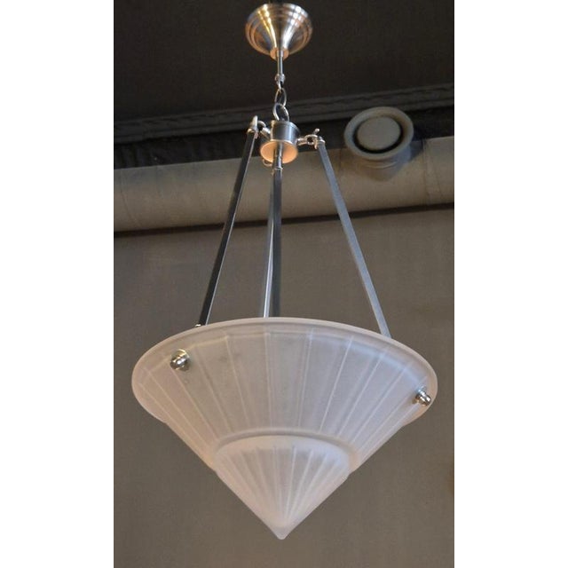 Art Deco Style Pendant by Vianne, France late 20th Century. The shade is from the factory whilst the metal base and wiring...