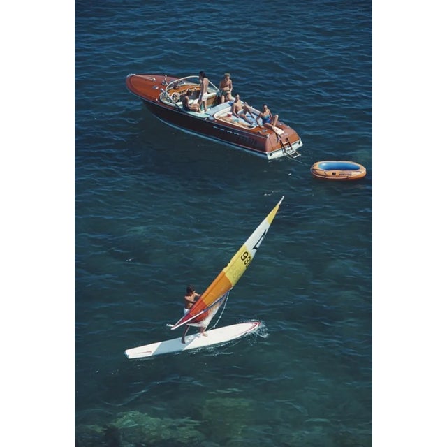 Slim Aarons, Porto Ercole, Estate Stamped Photographic Print, 1980 / 2020s For Sale