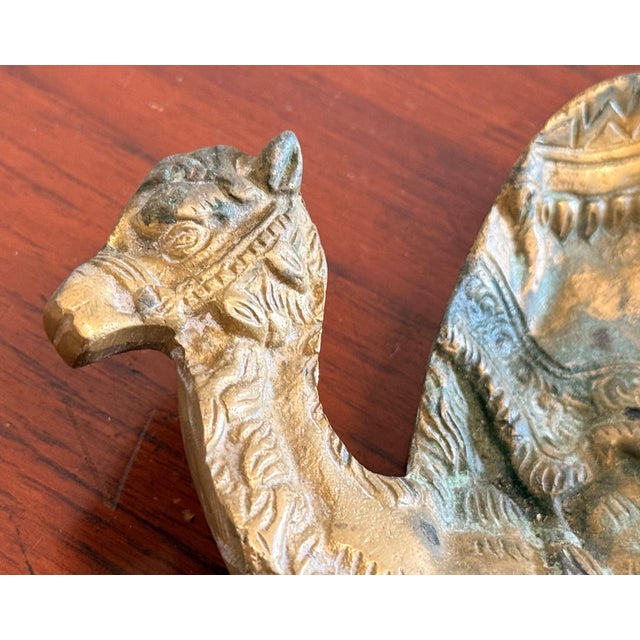This cast brass camel dish is a well-detailed example of Anglo-Indian decorative brasswork, with an elaborately...