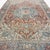 This stunning antique Heriz rug is a remarkable example of Persian craftsmanship, blending bold structure with refined...