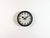 This wall clock was produced by Siemens in Germany during the 1950s. It features a black metal frame, a metal dial and a...