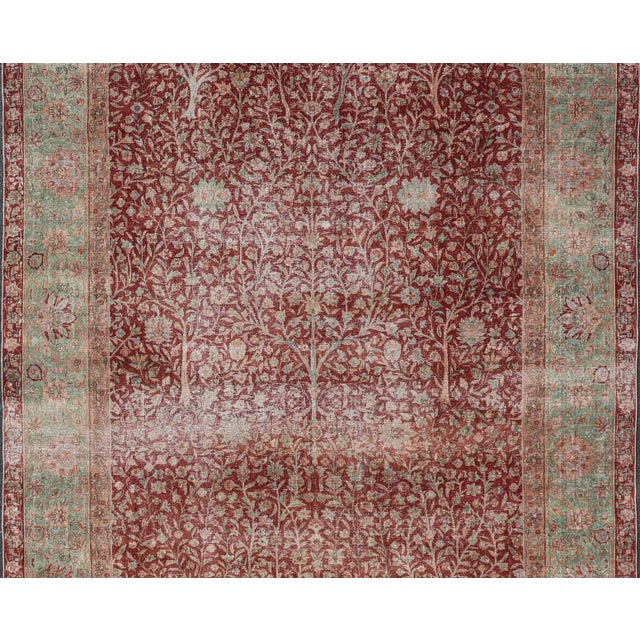 Measures: 9'10 x 14'7 Antique Indian Amritsar Rug with Tree of Life Design in Rich Reds 9'10 x 14'7. Keivan Woven Arts/...
