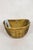 This hand-carved wooden bowl is made by the Turkana, a nomadic community in north-west Kenya prized for their woodcarving...