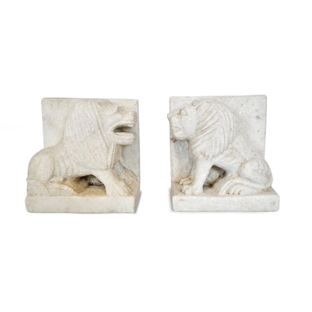 Hand chiseled unique white solid marble sitting lion bookend or doorstop. Each slightly unique in natural marble textures,...