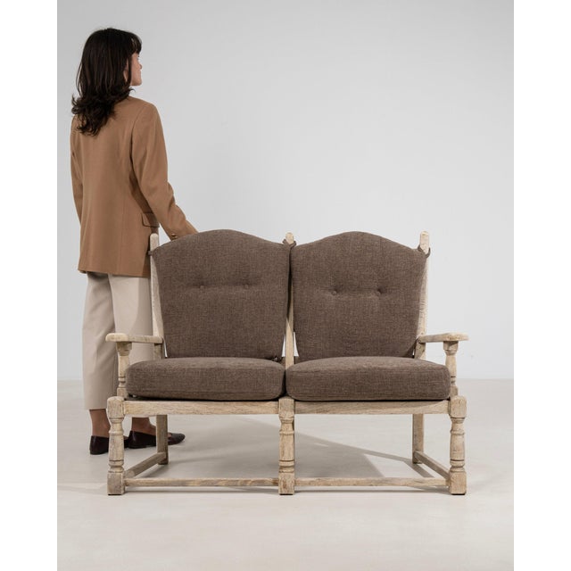 This chair makes its impression through natural bleached oak, cream cushion. Originating in France during 1970s, it shows...