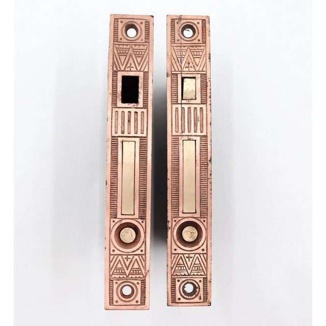 Antique 1880s Aesthetic style pocket door cast iron and brass mortise locks with a polished brass finish. No key is...