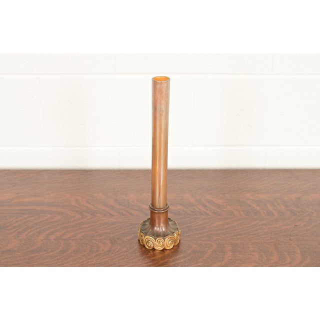 A gorgeous antique Arts & Crafts or Art Nouveau period Favrile iridescent art glass tall bud vase on gilt bronze stand By...