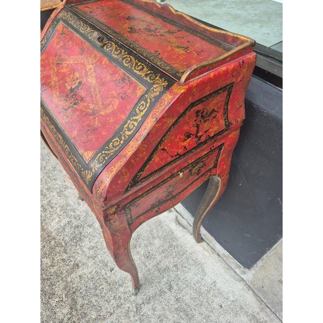 Impressive 19th century Louis XV style drop front desk entirely clad in red and black tooled leather with brass...