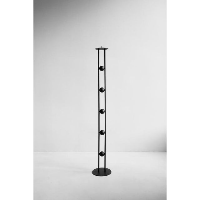 Ritual Candleholder IV Second Edition by Valeria Vasi Materials: Iron Dimensions: Ø 20 x H 125 cm. Inspired by medieval...