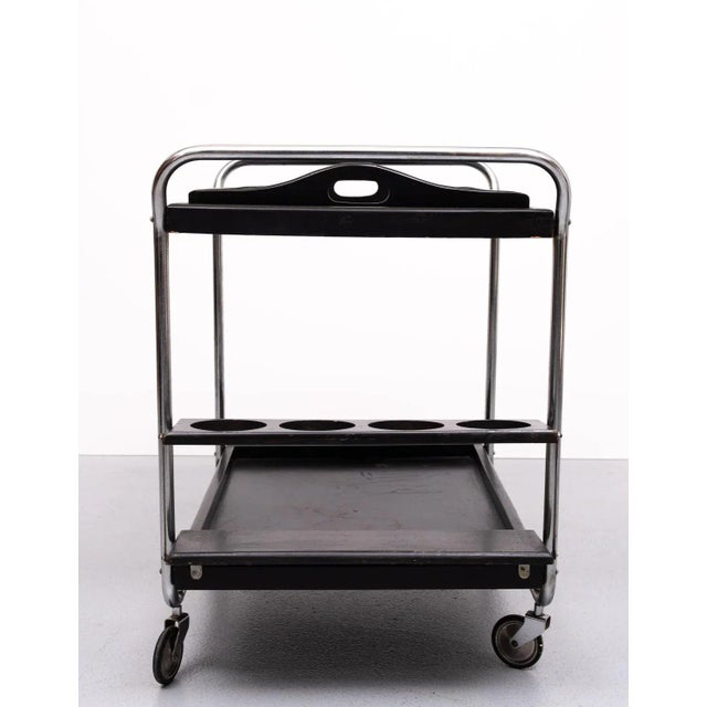 Still complete after all those years, this Bauhaus style serving trolley . Comes with a separated serving tray ,very handy...