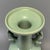 This Chinese Longquan celadon porcelain vase is equipped with a pair of exquisitely‑sculpted dragon‑form side handles. It...