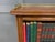 A good late Victorian period open bookcase. Of very good construction in solid walnut with a lovely pierced brass gallery...