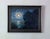 This artwork depicts a serene nocturnal landscape illuminated by a luminous full moon, casting a silvery glow on the...