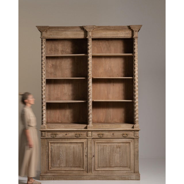 Carved oak glazed bookcase hutch in Weathered Honey Oak. Finished in weathered honey oak, this carved oak glazed bookcase...