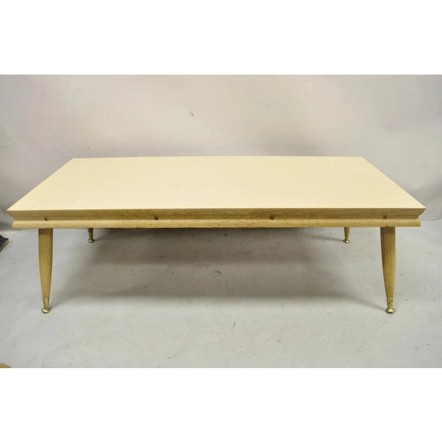 Vintage Mid Century Modern Atomic Era Laminate & Wood Coffee Table Set - 3 pc Set. Item features (2) end tables, (1)...