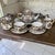 19th Century French Faience 8 piece Hand-Painted Tea Service represents the remarkably unique and definitively French...