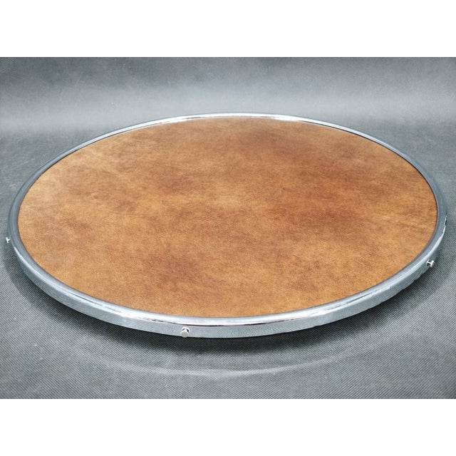 Elegant Art Deco rotating serving tray produced in Czechoslovakia during the 1940s. This sophisticated functionalist piece...