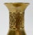 Vintage solid brass vase with Korean markings. Features two stylized borders in relief. Heavy. Lovely patina.