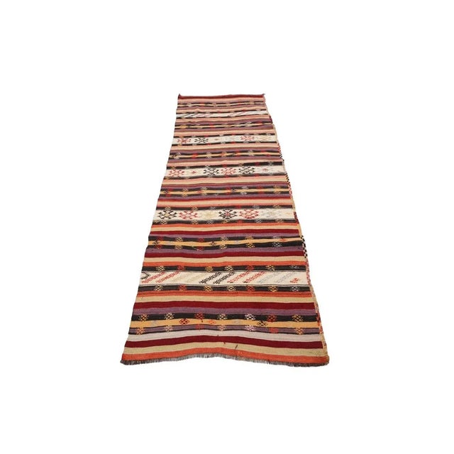 Handwoven vintage kilim runner rug from Denizli region of Turkey. Approximately 50-60 years old. In very good condition.