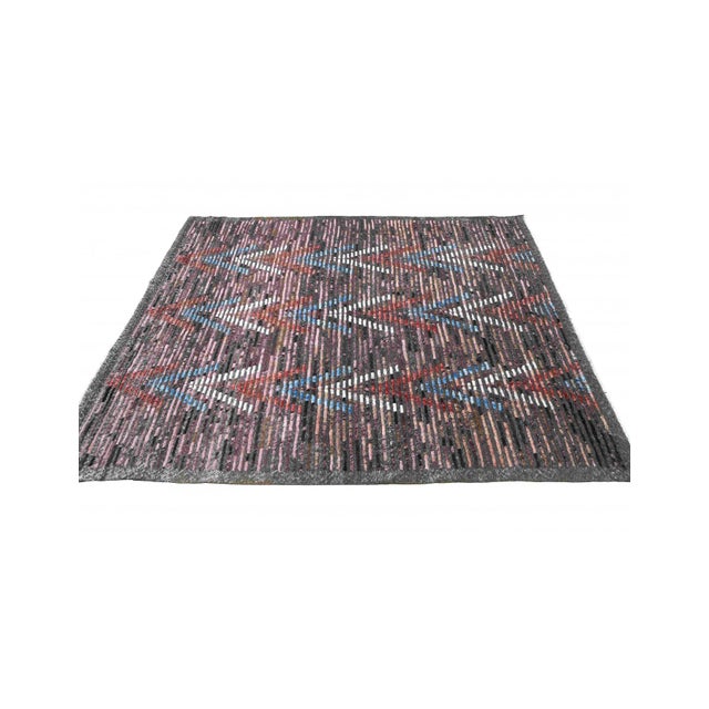 Hand knotted unique rug newly made in Afghanistan using hand spun wool.