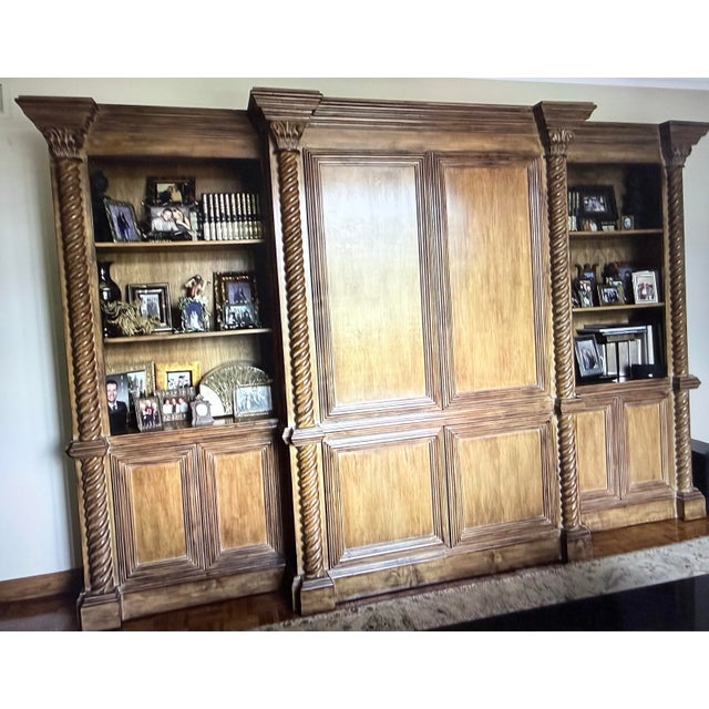 Beautiful credenza/entertainment center by Kreiss collection. The center portion opens up to a space for a television and...
